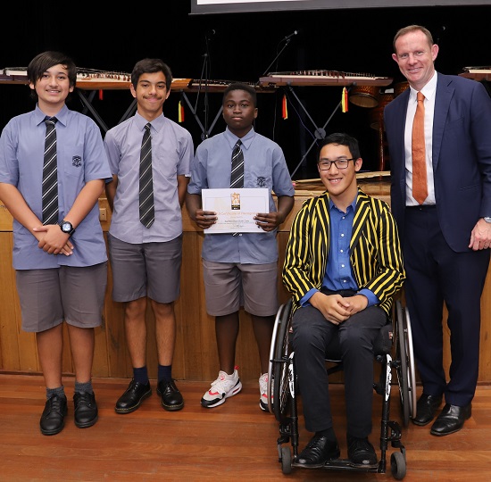 The Ashfield Boys Bush Care team with Mayor Darcy Byrne and Zarni Tun 2019 Young Citizen of the Year and member of the Balmain Parra Rowing Team